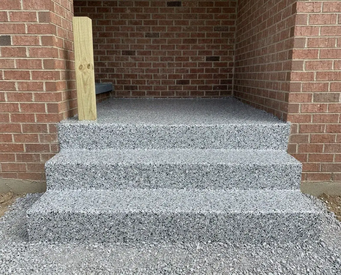 Newly poured concrete steps up a sloped front yard in Mission Viejo